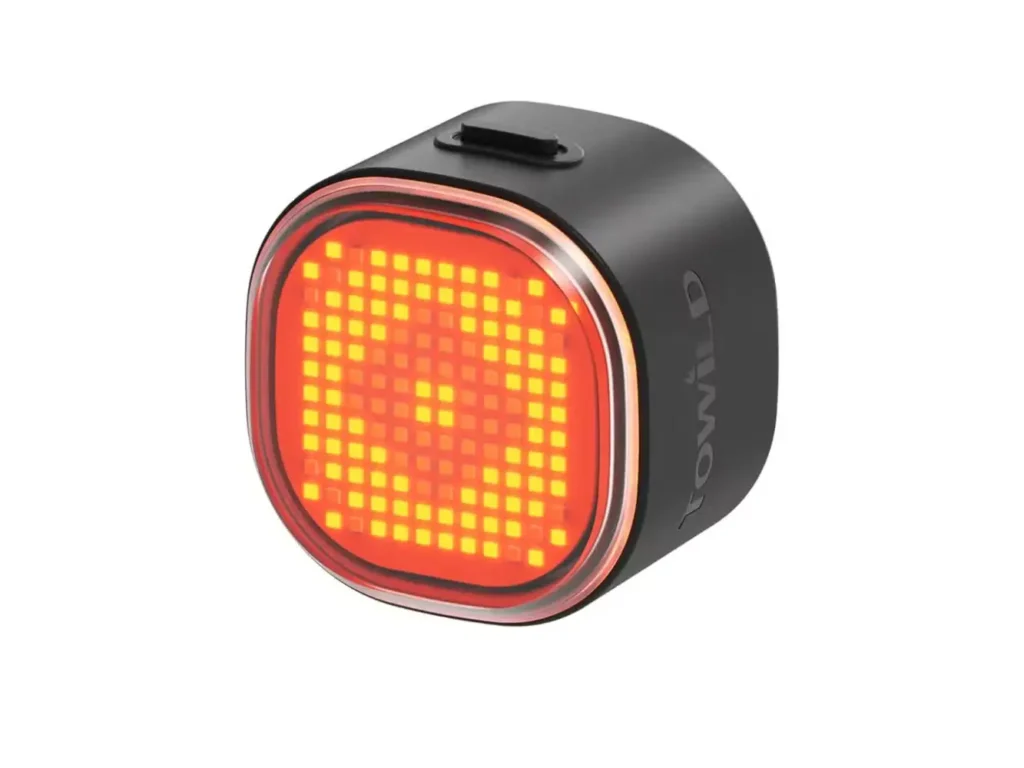 TOWILD TL08 customizable LED rear bike light mounted on a bicycle